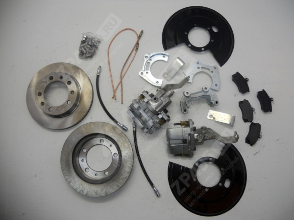 Артикул: 316335020101130 г0017414 Комплект дисковых тормозов Патриот Спайсер с 2013г.(суппорт ВАЗ 2112 под ручник) УАЗ ЗАДНИЙ МОСТ